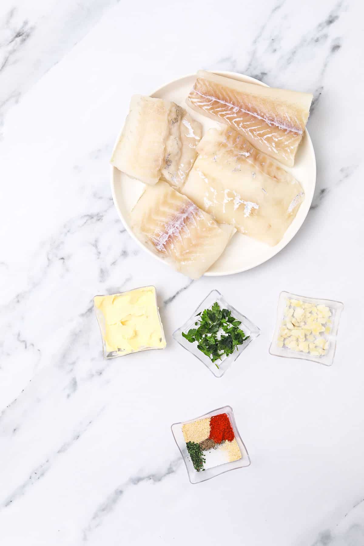 ingredients for pan cooked cod displayed.