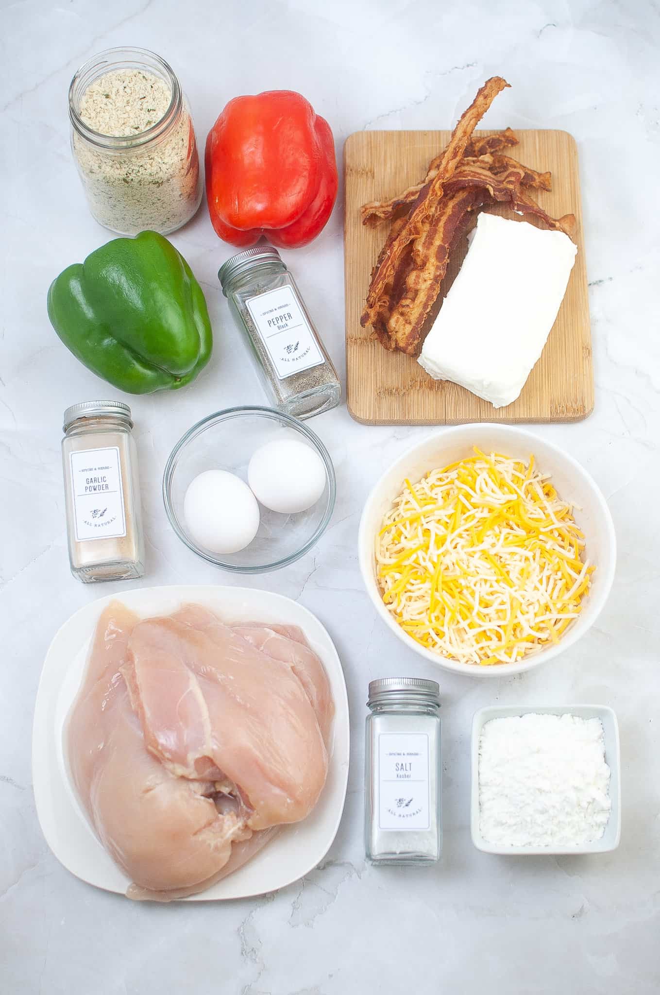 Most of the ingredients used in making air fryer stuffed chicken breasts.